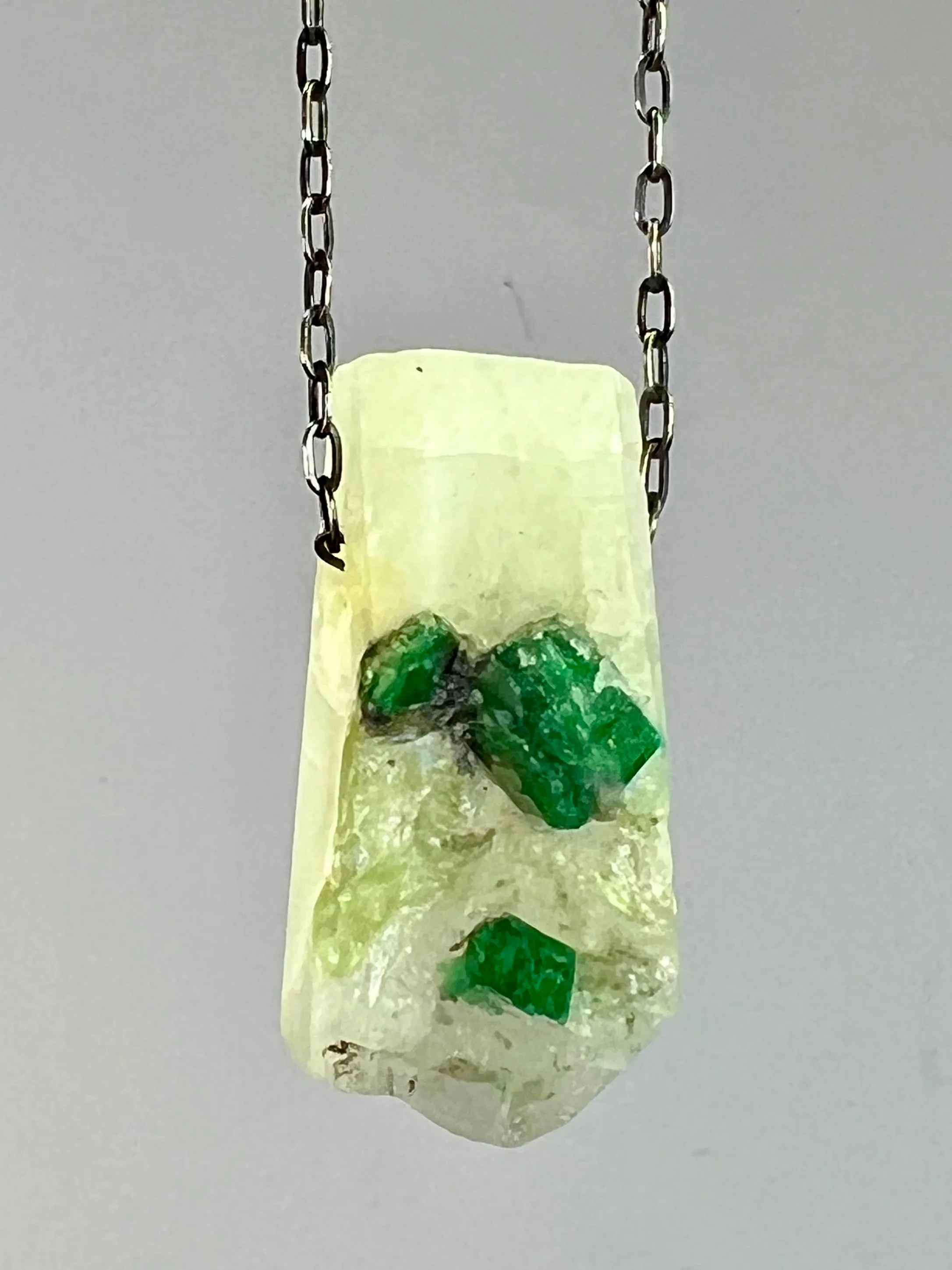 Emerald in White Quartz Crystal Necklace